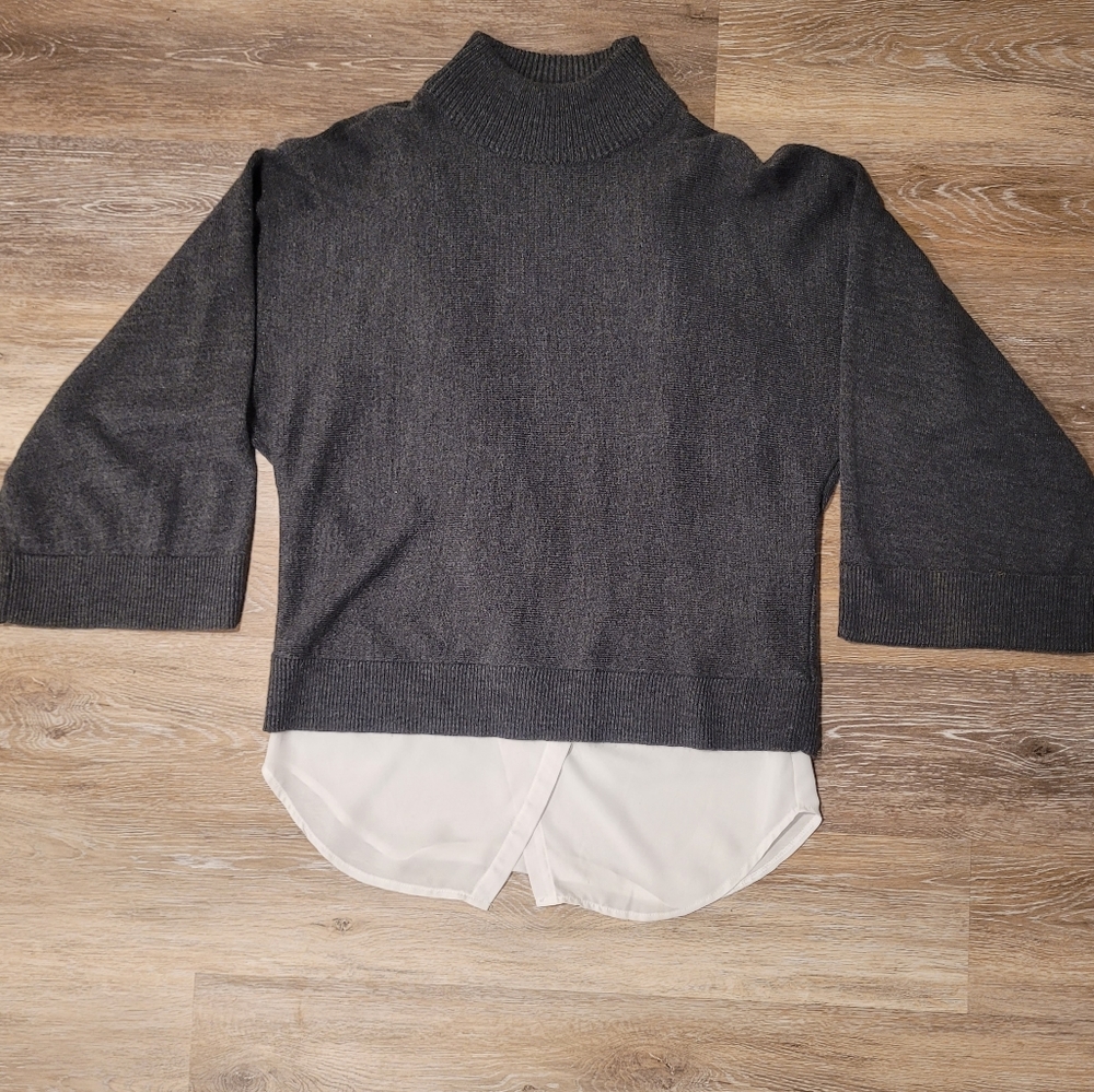 Grey sweater with satin underlay